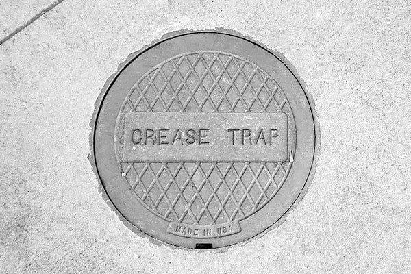 grease trap pumping involves removing all the accumulated grease and waste from the trap using specialized equipment
